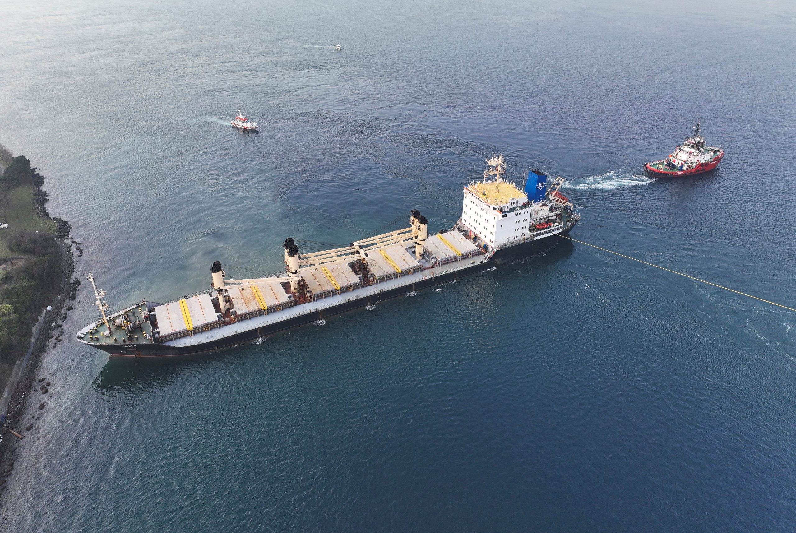 FILE PHOTO: Palau flagged bulker MKK1, carrying grain under UN’s Black Sea grain initiative, is towed free after running aground in Istanbul's Bosphorus